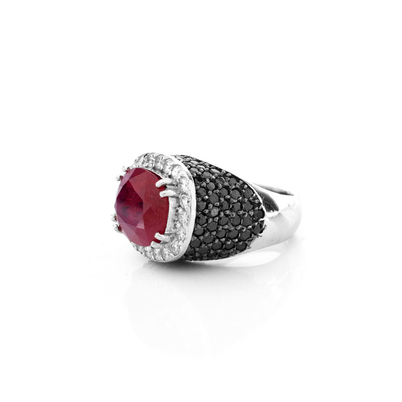 Approx. 5.11 Carat Oval Cut Ruby, 3.50 Carat Micro Pave Set Black Diamond, .61 Carat Round Brilliant Cut Diamond and 18 Karat White Gold Ring