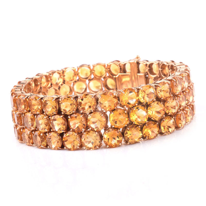 Circa 1950s Retro Continental Eighty Four (84) Round Brilliant Cut Citrine and 14 Karat Yellow Gold Three Row Bracelet