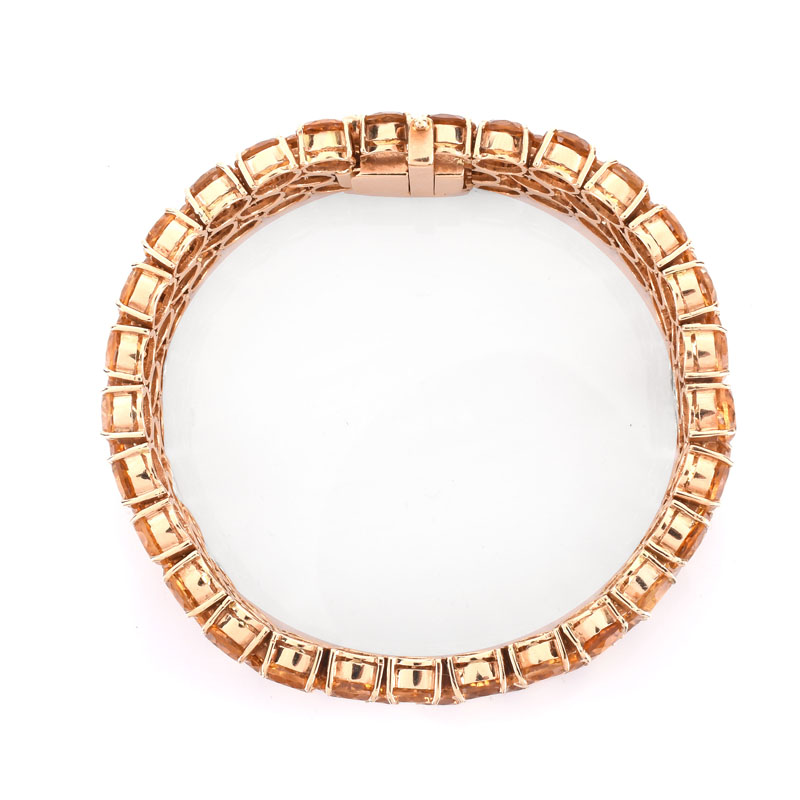 Circa 1950s Retro Continental Eighty Four (84) Round Brilliant Cut Citrine and 14 Karat Yellow Gold Three Row Bracelet