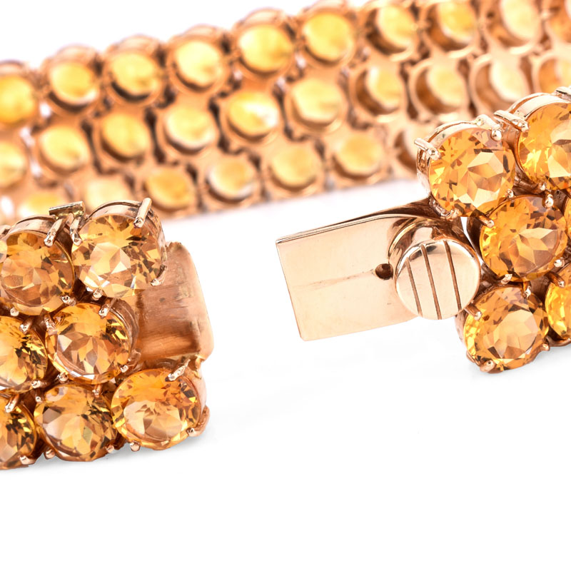 Circa 1950s Retro Continental Eighty Four (84) Round Brilliant Cut Citrine and 14 Karat Yellow Gold Three Row Bracelet