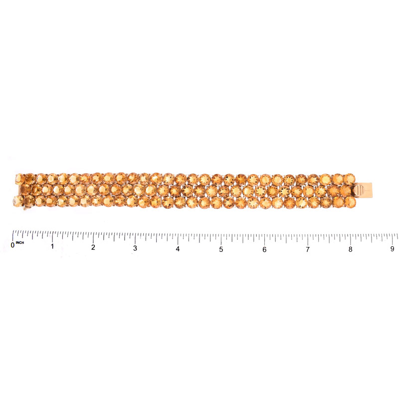 Circa 1950s Retro Continental Eighty Four (84) Round Brilliant Cut Citrine and 14 Karat Yellow Gold Three Row Bracelet