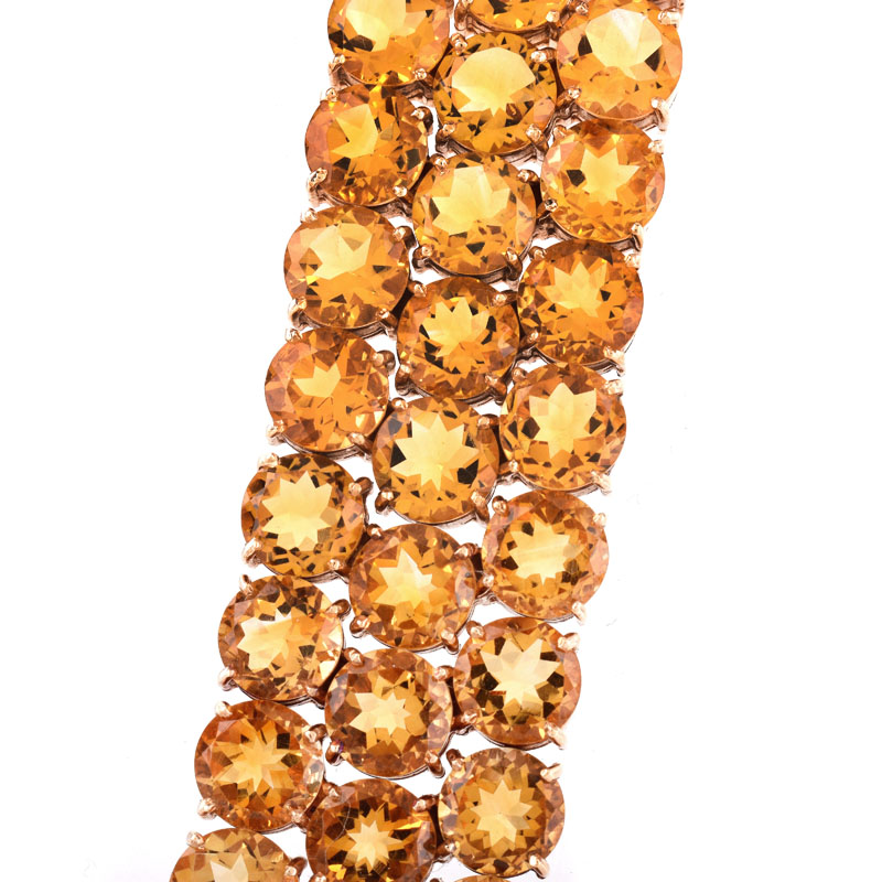 Circa 1950s Retro Continental Eighty Four (84) Round Brilliant Cut Citrine and 14 Karat Yellow Gold Three Row Bracelet