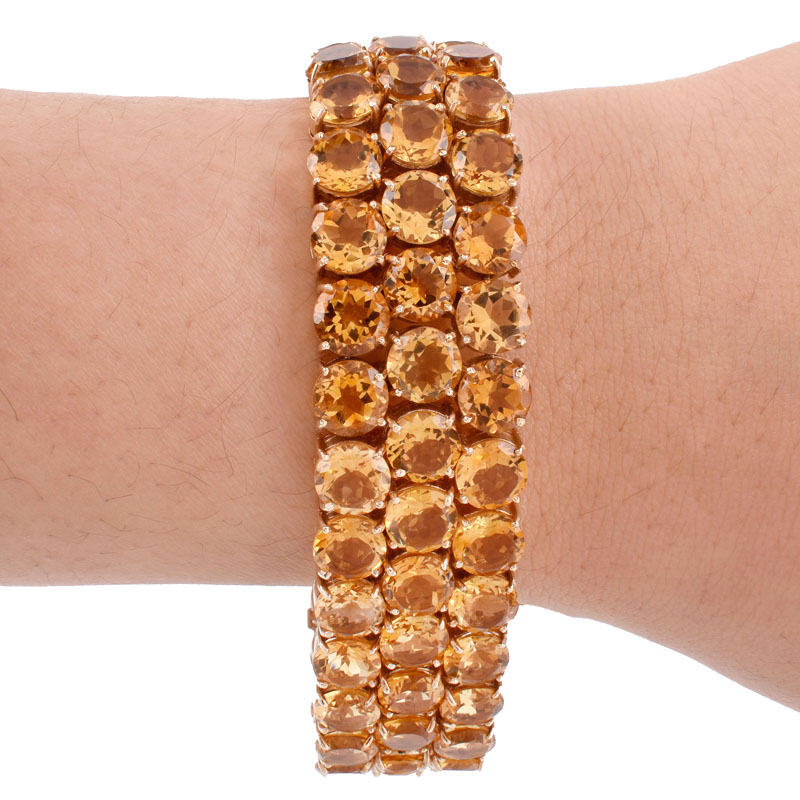 Circa 1950s Retro Continental Eighty Four (84) Round Brilliant Cut Citrine and 14 Karat Yellow Gold Three Row Bracelet