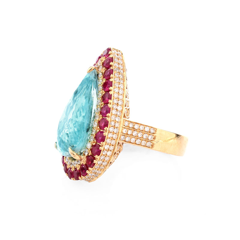 GIA Certified 11.70 Carat Pear Shape Paraiba Tourmaline, Diamond, Ruby and 18 Karat Yellow Gold Ring. 