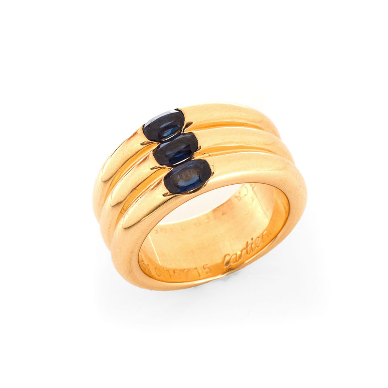 Cartier Approx. 1.10 Carat Oval Cut Sapphire and  18 Karat Yellow Gold 10mm Triple Stack Band Ring.