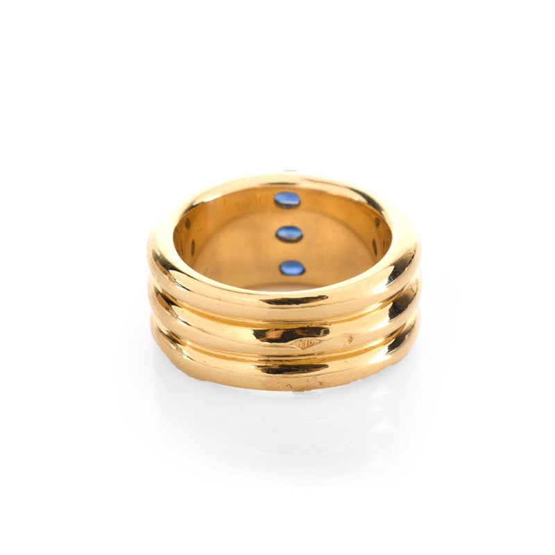 Cartier Approx. 1.10 Carat Oval Cut Sapphire and  18 Karat Yellow Gold 10mm Triple Stack Band Ring.