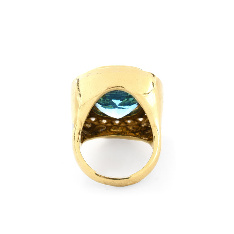 Vintage Approx. 18.0 Carat Oval Cut Aquamarine, 2.50 Carat Round Brilliant Cut Diamond and 18 Karat Yellow Gold Ring. 