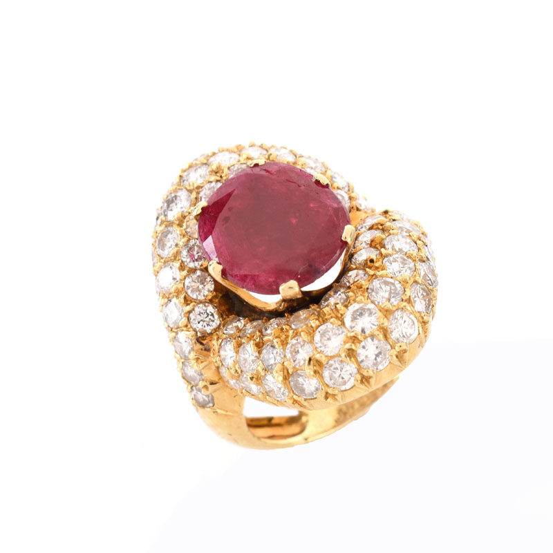 Vintage Approx. 4.0 Carat Pave Set Round Brilliant Cut Diamond, 4.50 Carat Oval Cut Ruby and 18 karat Yellow Gold Ring. 