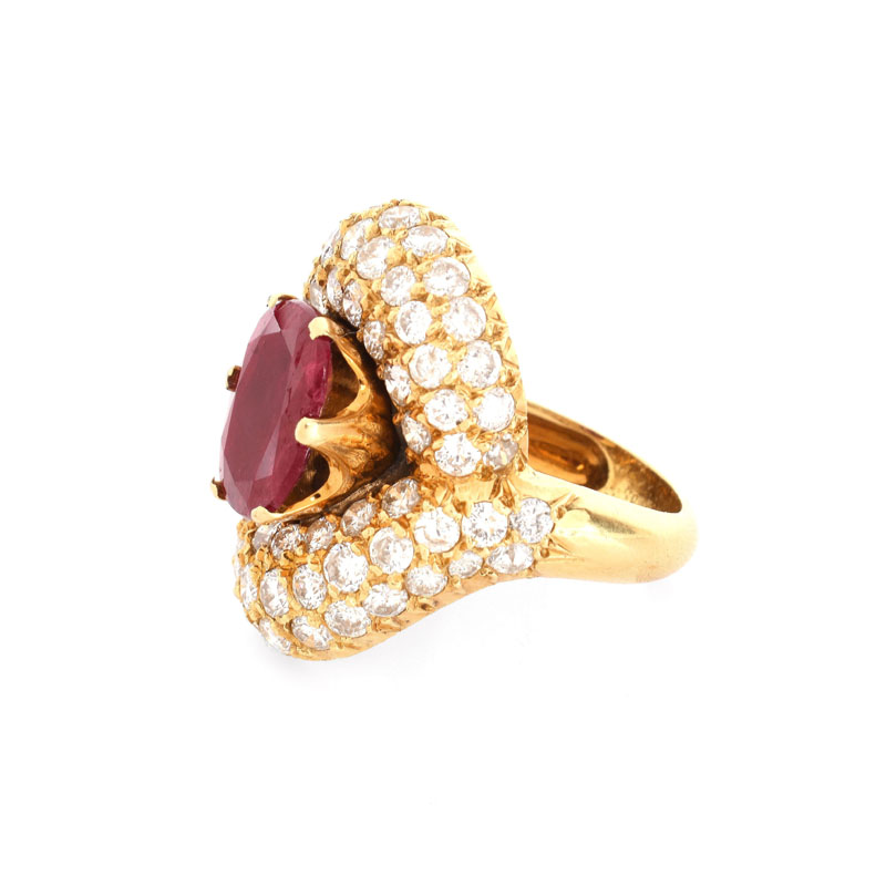 Vintage Approx. 4.0 Carat Pave Set Round Brilliant Cut Diamond, 4.50 Carat Oval Cut Ruby and 18 karat Yellow Gold Ring. 