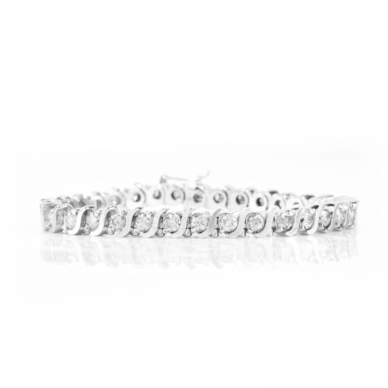 Vintage Approx. 4.0 Carat Round Brilliant Cut Diamond and 14 Karat White Gold Tennis Bracelet.