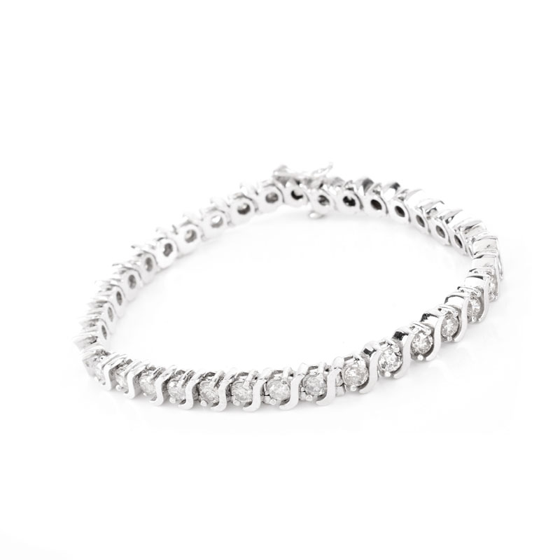 Vintage Approx. 4.0 Carat Round Brilliant Cut Diamond and 14 Karat White Gold Tennis Bracelet.