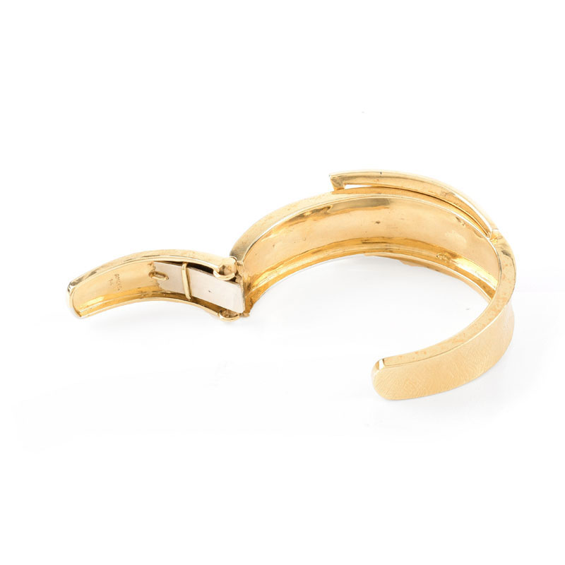 14 Karat Yellow Gold and Ten (10) Round Brilliant Cut Diamond Cuff Bangle Bracelet.