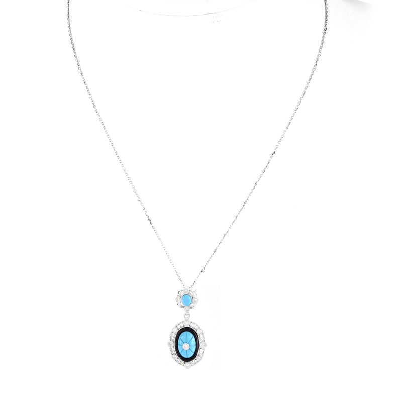 Turquoise, Diamond, Black Onyx and 18 Karat White Gold Pendant Necklace. 