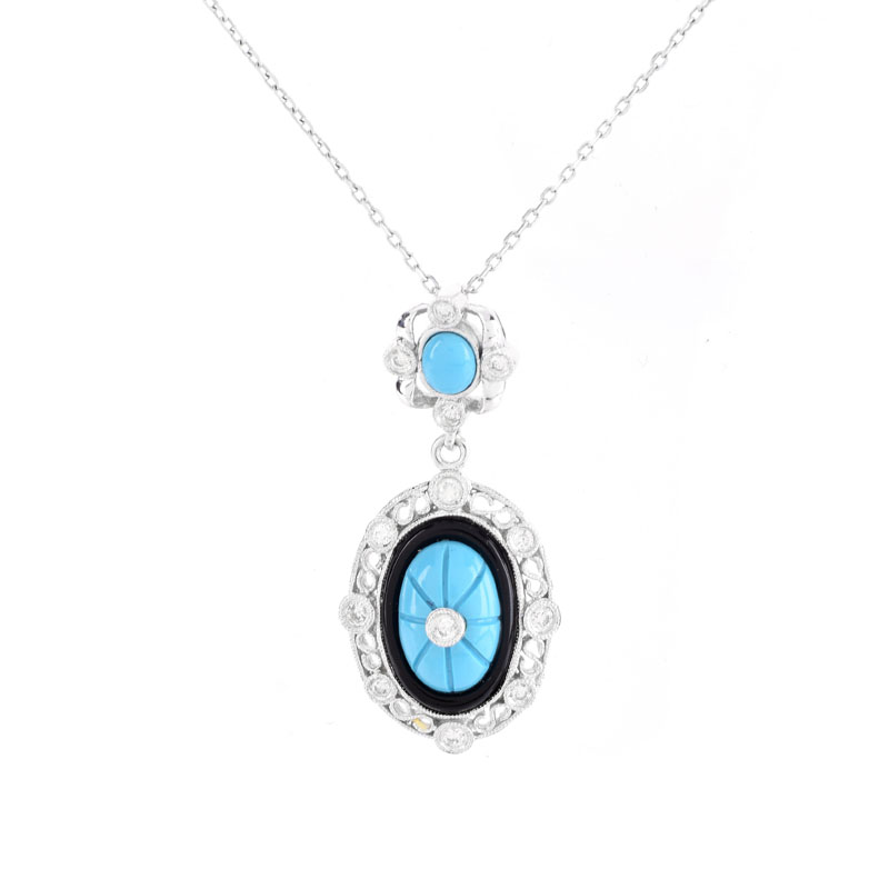 Turquoise, Diamond, Black Onyx and 18 Karat White Gold Pendant Necklace. 