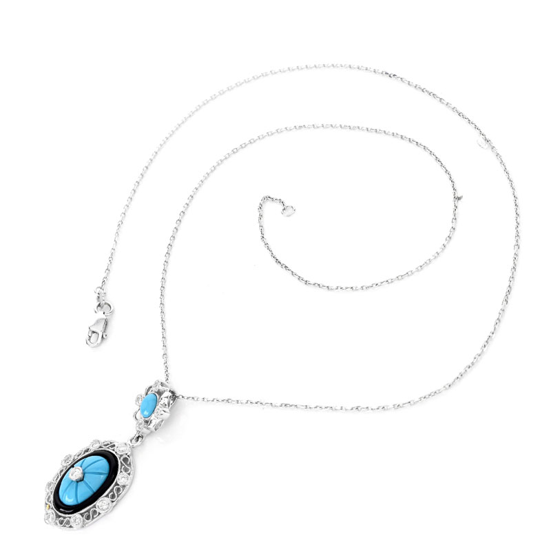 Turquoise, Diamond, Black Onyx and 18 Karat White Gold Pendant Necklace. 