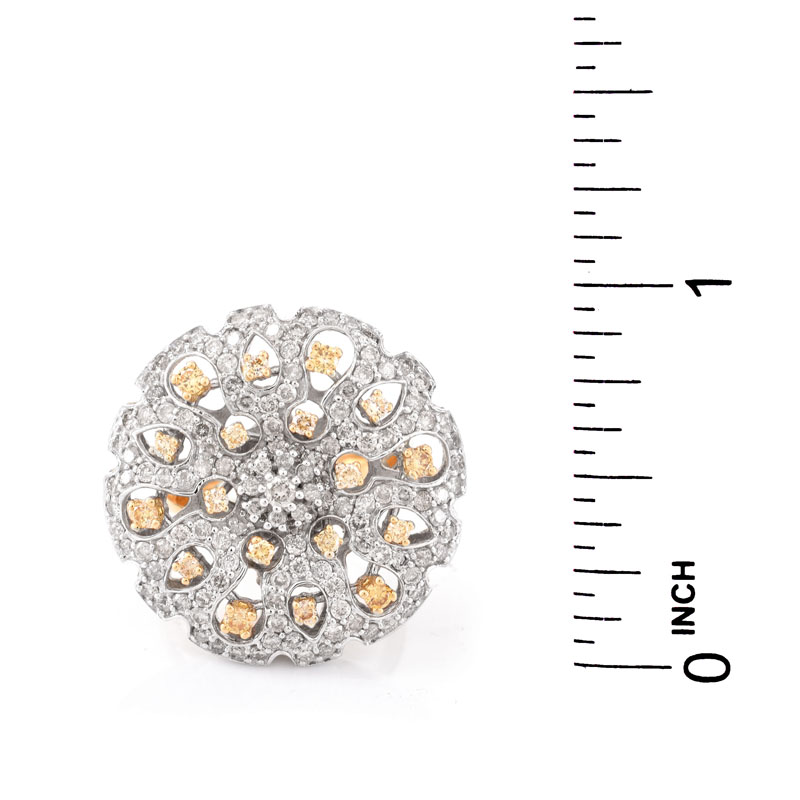 Approx. 1.40 Carat Pave Set Round Brilliant Cut White Diamond, .40 Carat Round Brilliant Cut Fancy Yellow Diamond and 18 Karat Yellow Gold Ring.