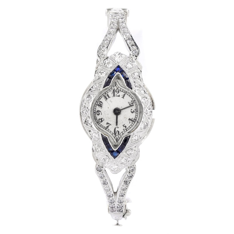 Art Deco Diamond, Sapphire and Platinum Bangle Bracelet Watch.
