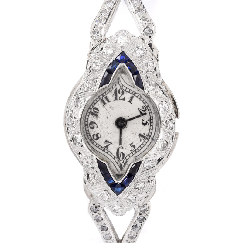 Art Deco Diamond, Sapphire and Platinum Bangle Bracelet Watch.