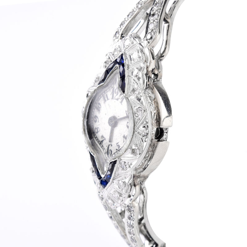 Art Deco Diamond, Sapphire and Platinum Bangle Bracelet Watch.