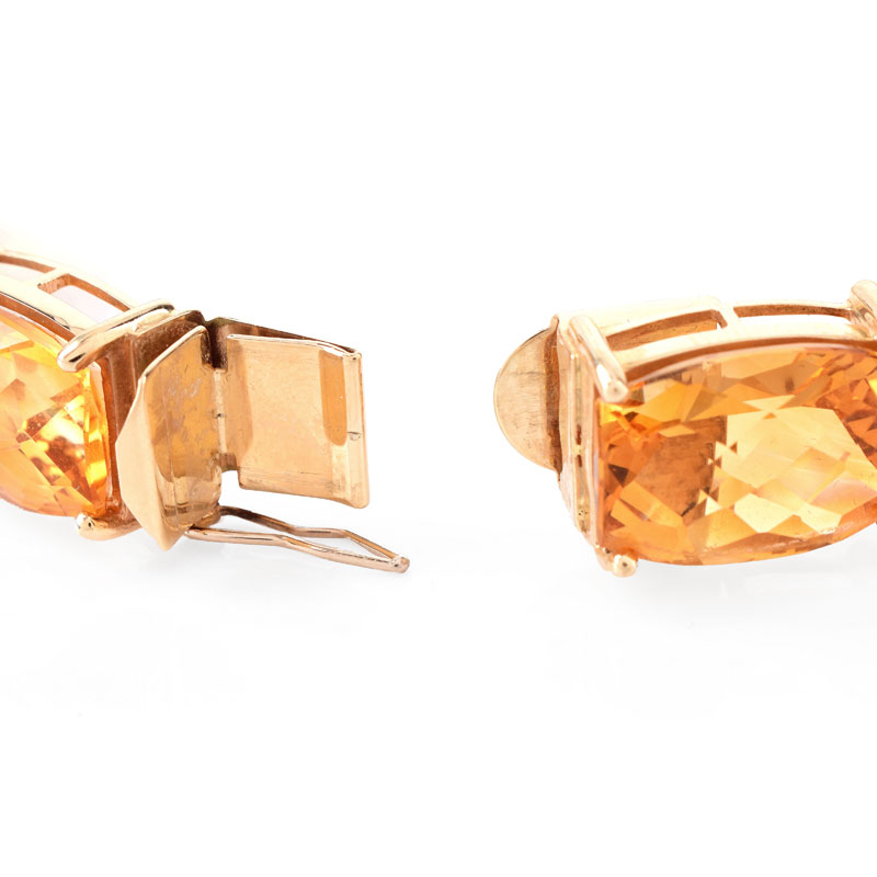 Criss Cross Cut Citrine and 14 Karat Yellow Gold Bracelet.