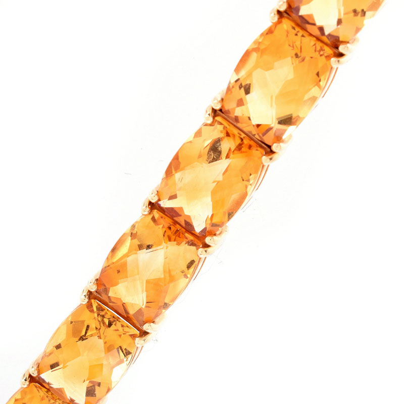 Criss Cross Cut Citrine and 14 Karat Yellow Gold Bracelet.