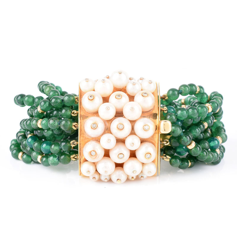 Circa 1950s Multi Strand Emerald Bead, Pearl and 18 Karat Yellow Gold Bracelet. Emerald beads measure 4mm.