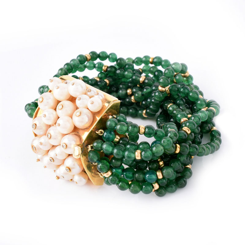 Circa 1950s Multi Strand Emerald Bead, Pearl and 18 Karat Yellow Gold Bracelet. Emerald beads measure 4mm.