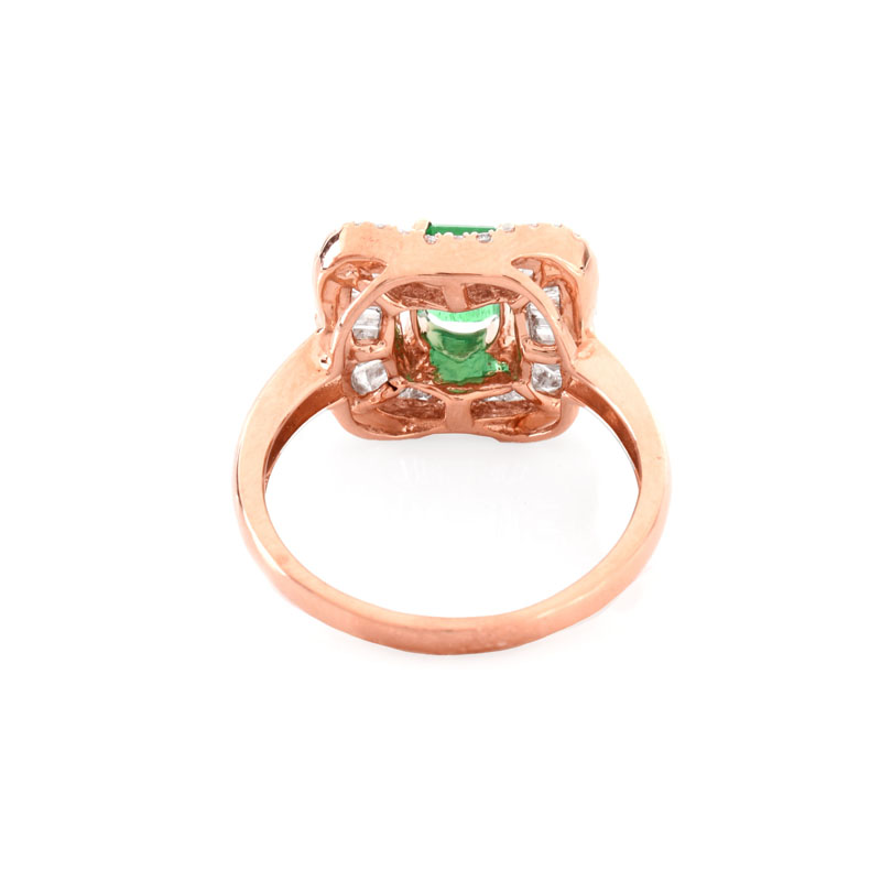 Approx. .75 Carat Colombian Emerald, 1.0 Carat Baguette and Round Brilliant Cut Diamond and 14 Karat Pink Gold Ring. 