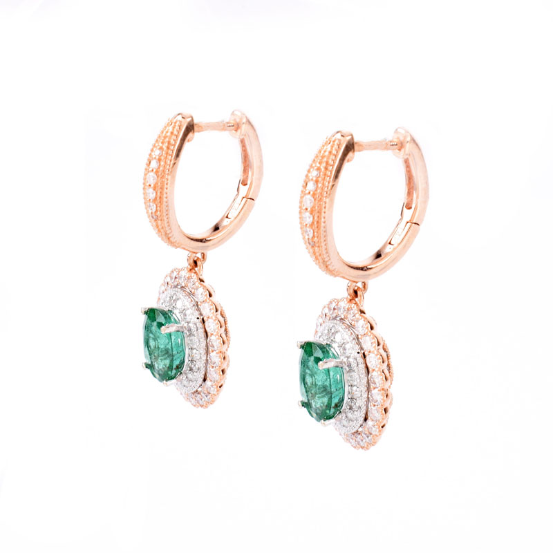 Pair of Oval Cut Colombian Emerald, Round Brilliant Cut Diamond and 14 Karat Rose Gold Pendant earrings, Emeralds with vivid color. 