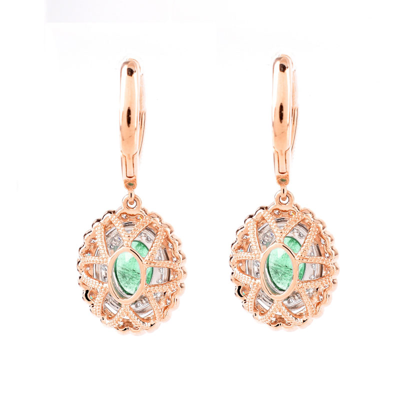 Pair of Oval Cut Colombian Emerald, Round Brilliant Cut Diamond and 14 Karat Rose Gold Pendant earrings, Emeralds with vivid color. 