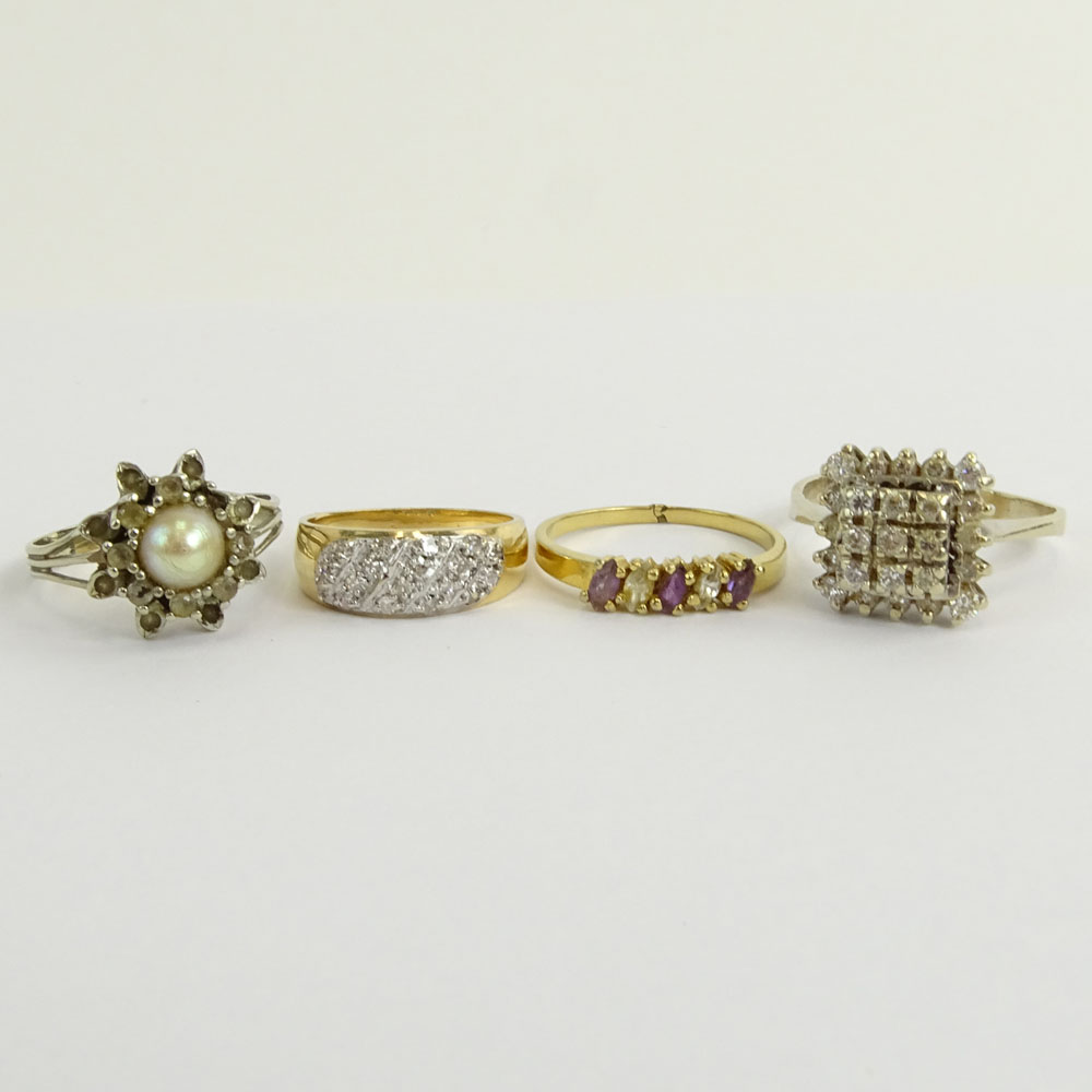 Collection of Four (4) Diamond and Gemstone Rings. Two (2) signed 14K. Good vintage condition. Ring sizes 5, 7, 8, 8-1/2. 