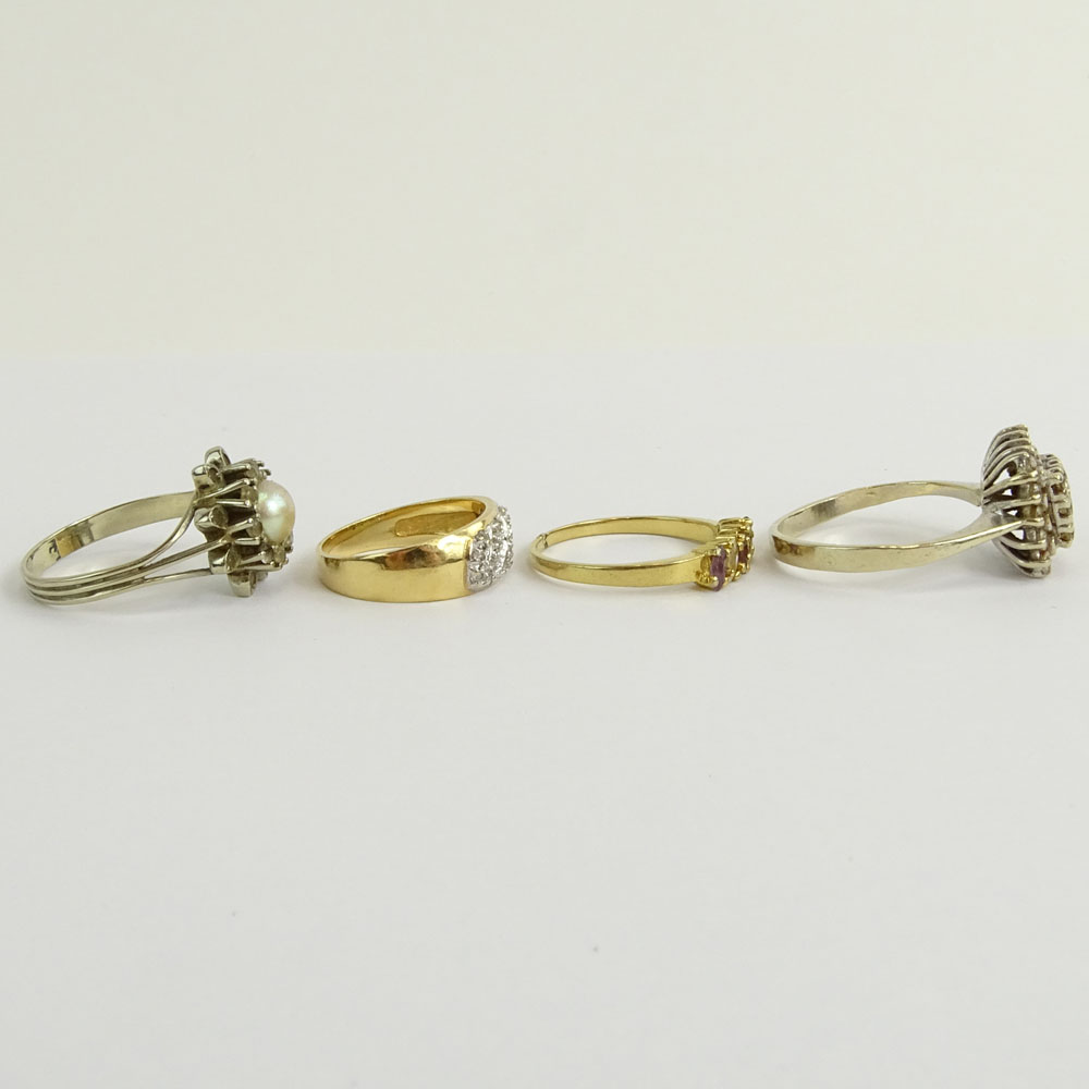 Collection of Four (4) Diamond and Gemstone Rings. Two (2) signed 14K. Good vintage condition. Ring sizes 5, 7, 8, 8-1/2. 