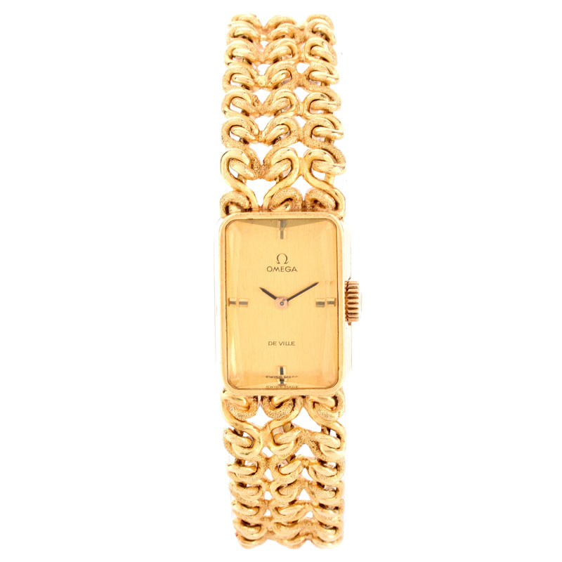 Lady's Vintage Omega De Ville 18 Karat Yellow Gold Bracelet Watch with Manual Movement.