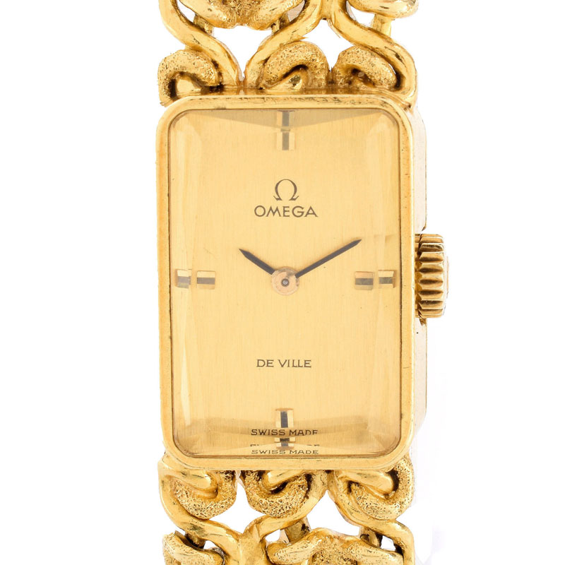 Lady's Vintage Omega De Ville 18 Karat Yellow Gold Bracelet Watch with Manual Movement.