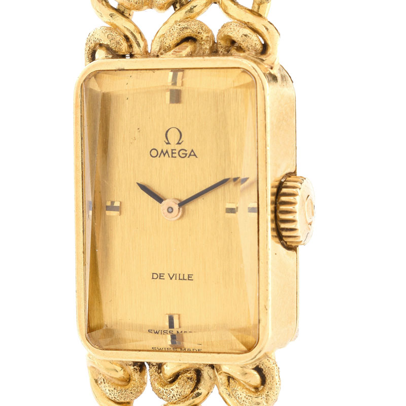 Lady's Vintage Omega De Ville 18 Karat Yellow Gold Bracelet Watch with Manual Movement.