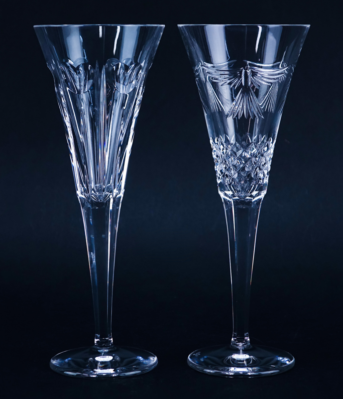 Four (4) Tall Waterford Crystal Champagne Flutes. Signed.