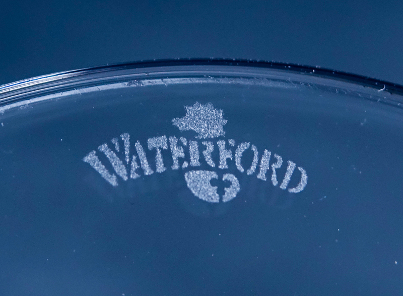 Four (4) Tall Waterford Crystal Champagne Flutes. Signed.