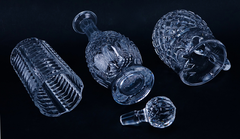Three (3) Waterford Crystal Tableware. Includes: decanter, pitcher, and cylindrical vase.