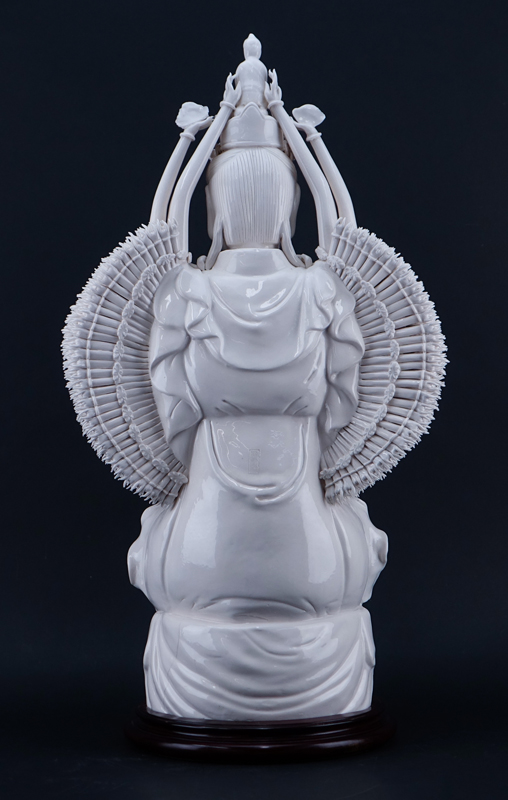 Large Chinese Blanc de Chine Guanyin with a Thousand Arms On Wooden Base.