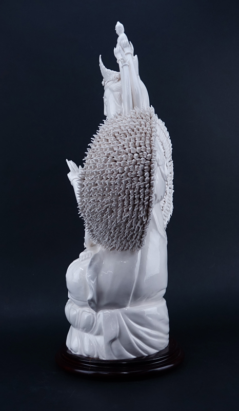 Large Chinese Blanc de Chine Guanyin with a Thousand Arms On Wooden Base.