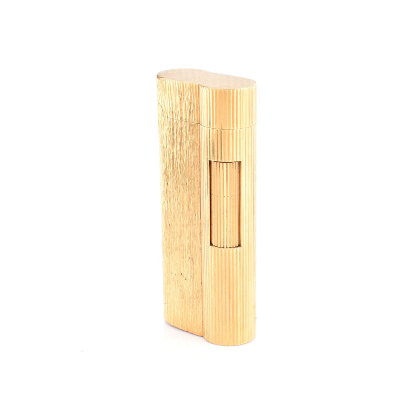 Vintage Dunhill Gold Plated Butane Lighter. Signed. Normal surface wear. Measures 2-9/16" H, 1-1/8" W.