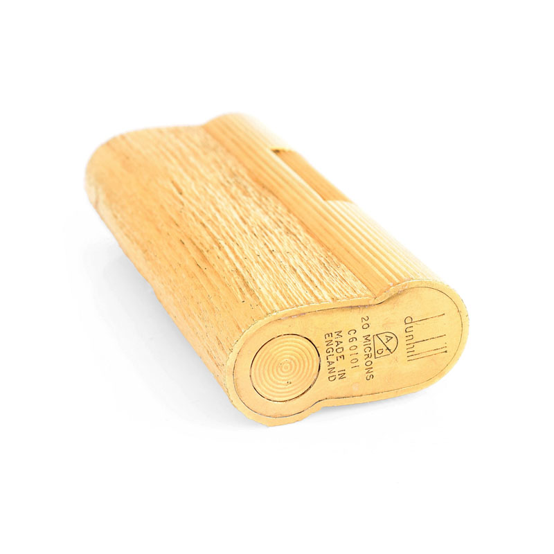 Vintage Dunhill Gold Plated Butane Lighter. Signed. Normal surface wear. Measures 2-9/16" H, 1-1/8" W.