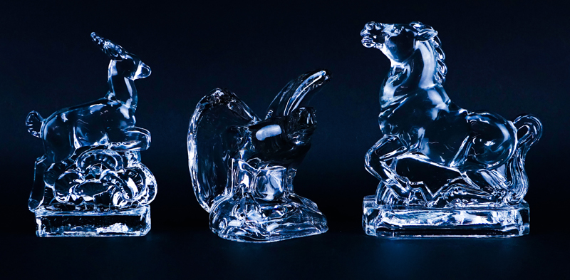 Lot of Six (6) Fostoria Glass Figural Bookends. Consisting of four pairs.