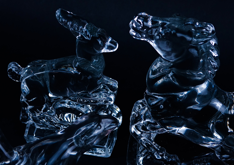 Lot of Six (6) Fostoria Glass Figural Bookends. Consisting of four pairs.