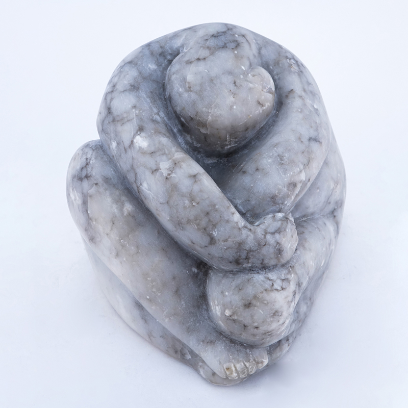Mid Century White Marble Sculpture of Figure in a Seated Position. Signed illegibly.