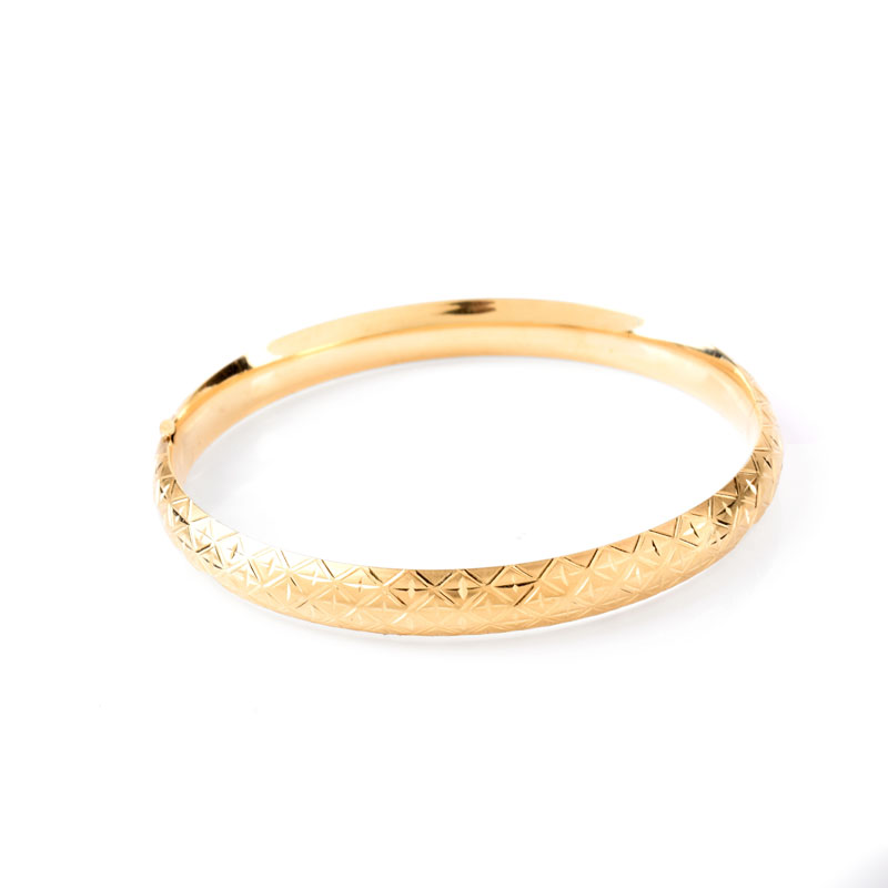 Pair of Vintage 14 Karat Yellow Gold Hinged Bangle Bracelets. Stamped 14K.