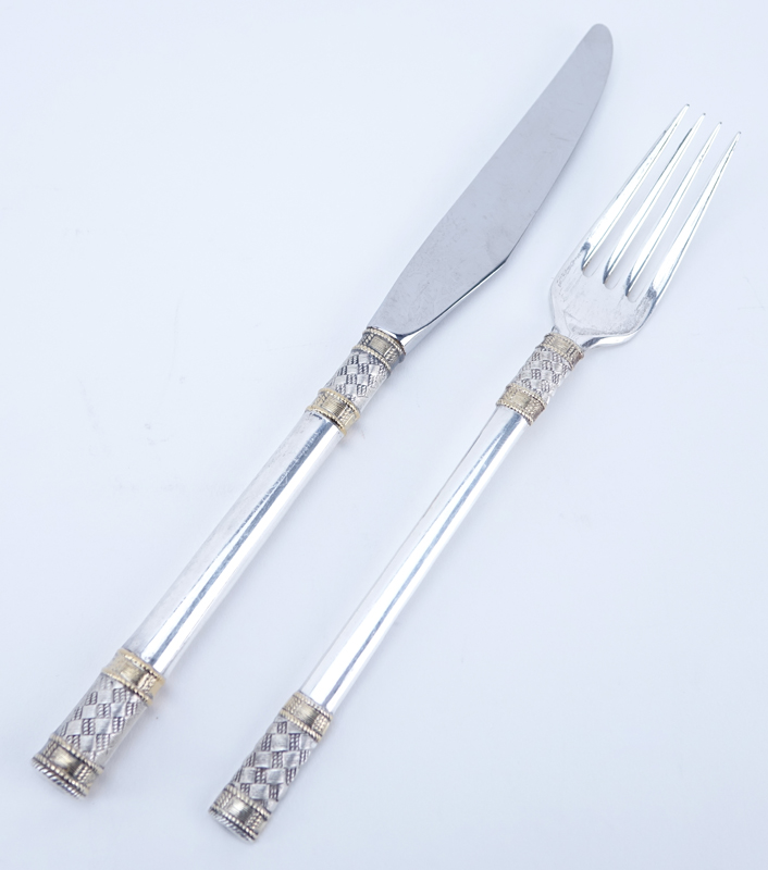 Ninety-Four (94) Piece Wallace Golden Aegean Weave Sterling Silver Flatware Set.