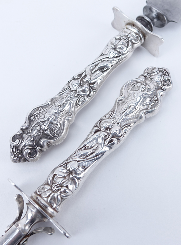 Four (4) Sterling Silver Serving Utensils. Includes Wallace Irian sterling handled carving set with sharpening steel and Watson reticulated serving tongs.