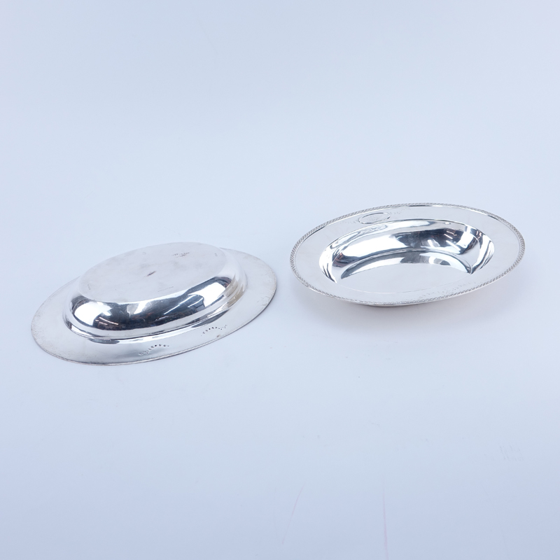 Pair Brand-Chatillon Sterling Silver Oval Serving Bowls. Decorated with Vitruvian scroll rim, monogram in cartouche.