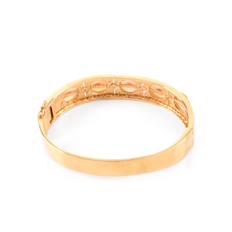Micro Pave Set Diamond, Pearl and 14 Karat Yellow Gold Hinged Bangle Bracelet.
